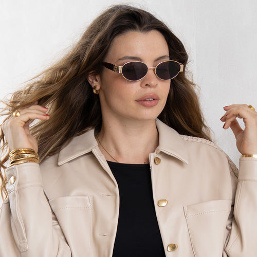 Isla gold oval women's designer sunglasses black lens