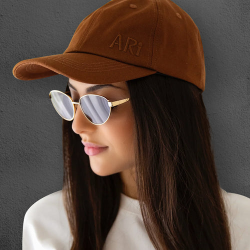 Zephyr gold frame cat-eye sunglasses with green lens